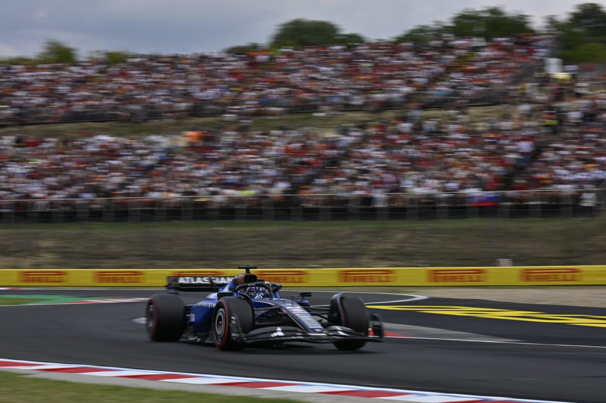 Williams driver Alexander Albon of Thailand steers his car during the qualifying session for the Hungarian Formula One Grand Prix at the Hungaroring racetrack in Mogyorod, Hungary. - AP Photo/Denes Erdos