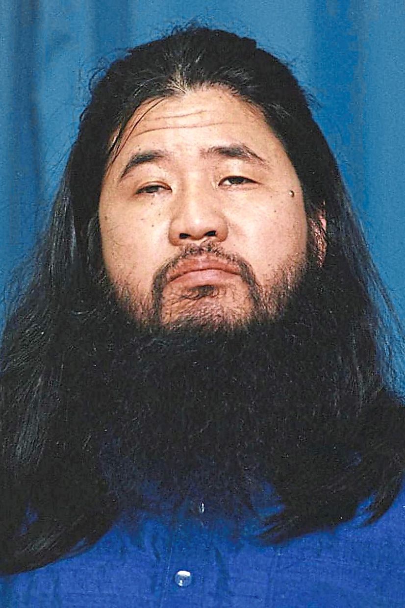 Shoko Asahara was the leader of the Japanese religious cult Aum Shinrikyo, which was responsible for the deadly sarin gas attack on the Tokyo Metro in 1995. He convinced his followers that only they would survive a prophesied World War III and take over Japan. 