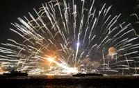 Barges carrying fireworks ablaze in Japan, five flee into sea