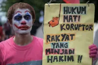18-month jail sentence for sandals thief sparks corruption debate in Indonesia