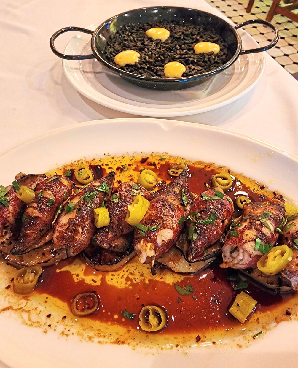 Char-grilled baby squid and squid ink rice will take diners on a wondrous underwater odyssey.