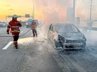 Car fire shuts down bridge