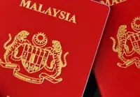 Housewife charged with possession of 205 M'sian passports, fake MyKad