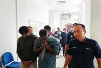 Trio charged with arranging to smuggle Sri Lankan national via KLIA