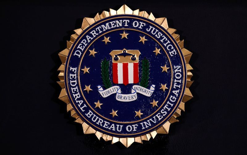 FBI ousts ex-acting director, other agents, in latest purge, people briefed say