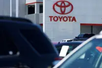 US confirms it’ll end tariff stacking, cut car levy, Japan says
