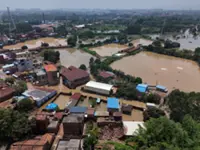 Flash floods kill at least 10 people and leave 33 missing in northwestern China