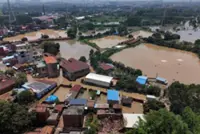 Chinese villagers hit by worst floods in generations say they had no warning