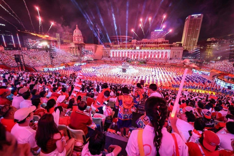 Fireworks going off during the final act of the Singapore National Day Parade at the Padang on Saturday, Aug 9, 2025. -- ST PHOTO: BRIAN TEO