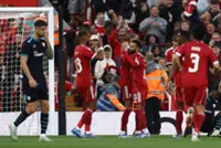 Soccer-Champions Liverpool armed with new weapons but repeat act will be tough