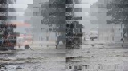 Roads waterlogged, over 180 flights delayed as heavy rains lash the Indian capital and its outskirts