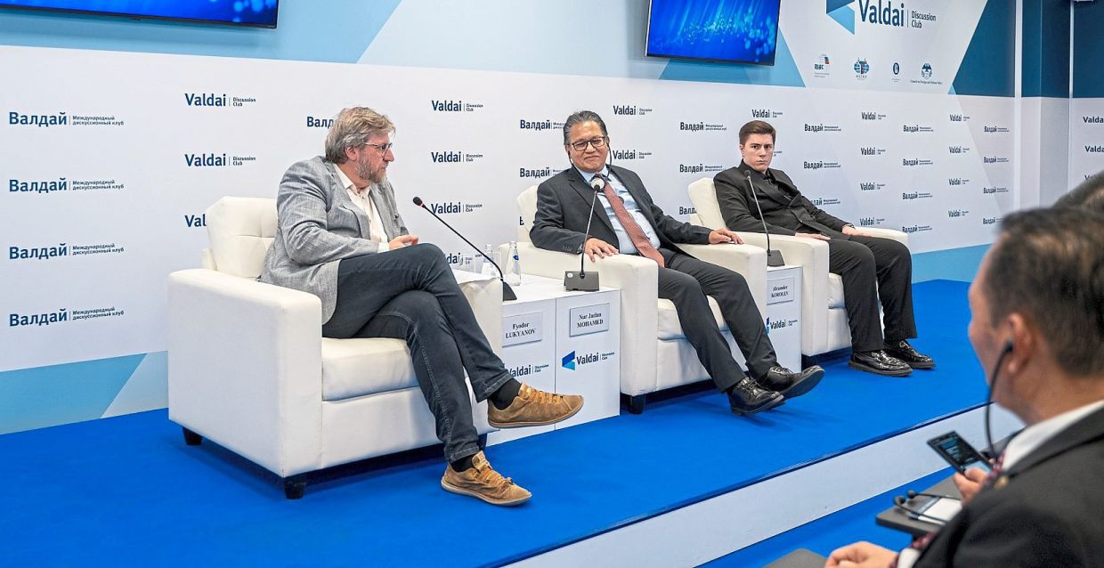The writer (centre) at the Valdai Discussion Club, a leading forum for global policy discussion with Russia’s policy elite. — Photo provided