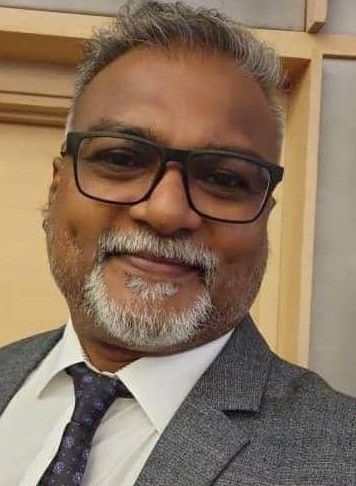 National darts team manager C. Pathmanathan.