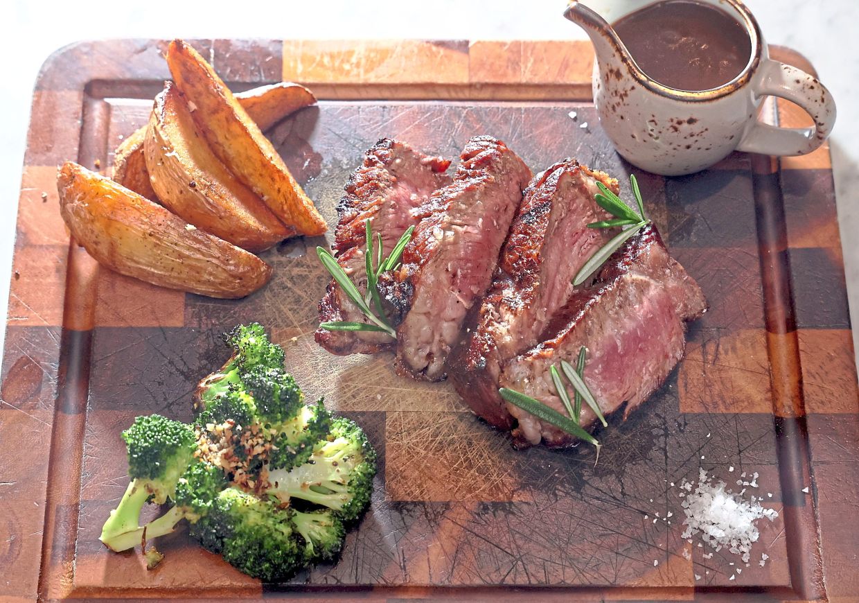 The wagyu striploin has been cooked in a Josper oven and retains tender, juicy meat. — Photos: ART CHEN/The Star
