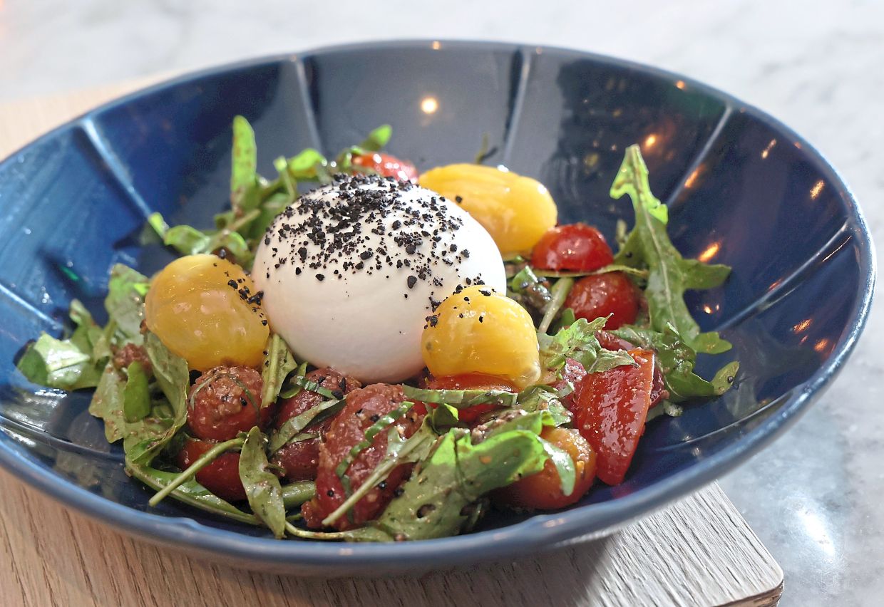 Italian burrata cheese is the binding force in this light, refreshing salad.