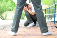 Confront bullying early, consistently and seriously