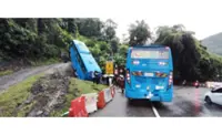 Four injured after factory bus skids off road in Paya Terubong