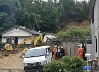 Torrential rains in southern Japan cause flooding, mudslides, and travel disruptions