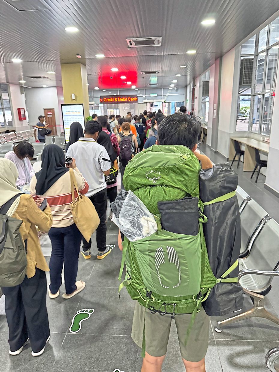 While everybody goes to work, one guy is going camping.