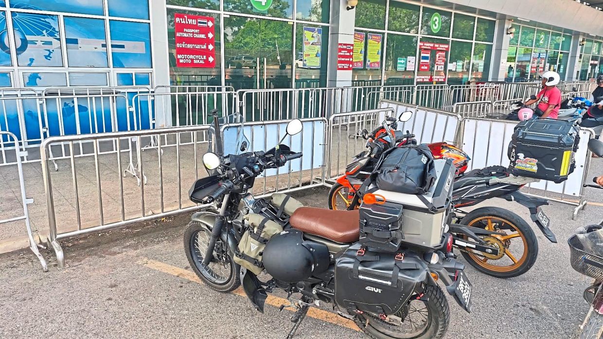 Upon arrival at the Thai border immigration and customs checkpoint in Danok, Southern Thailand, marking the first gateway into the Land of Smiles.