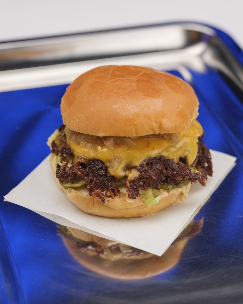 A smash burger at the Tesla Diner in Los Angeles.