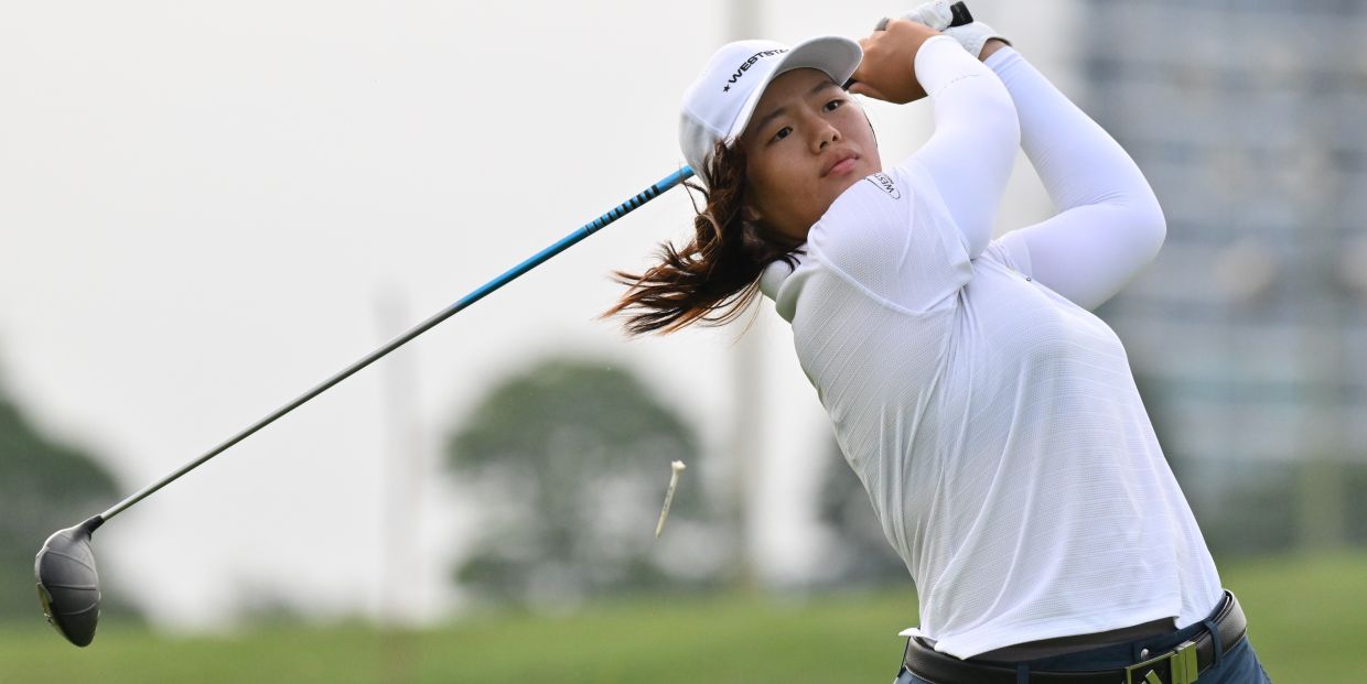 Malaysian golfer Ng Jing Xuen in action during the second round of the qualifiers.