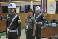 Military court sentences Indonesian soldier to death for killing three policemen