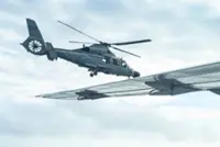 Chinese fighter 'intercepts' Philippine plane over disputed shoal, Manila says 