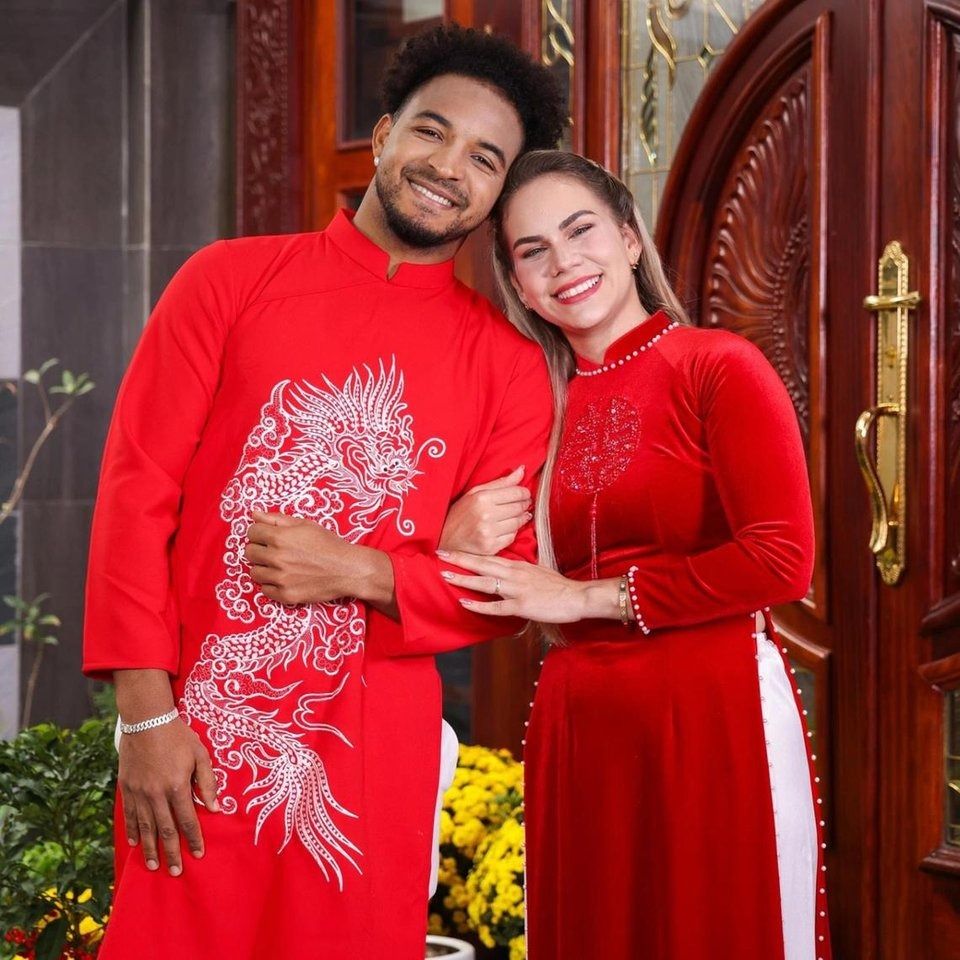 Nguyen Xuan Son and his wife Marcele Seippel, who is wearing the Vietnamese traditional dress called an ao dai. - NGUYEN XUAN SON