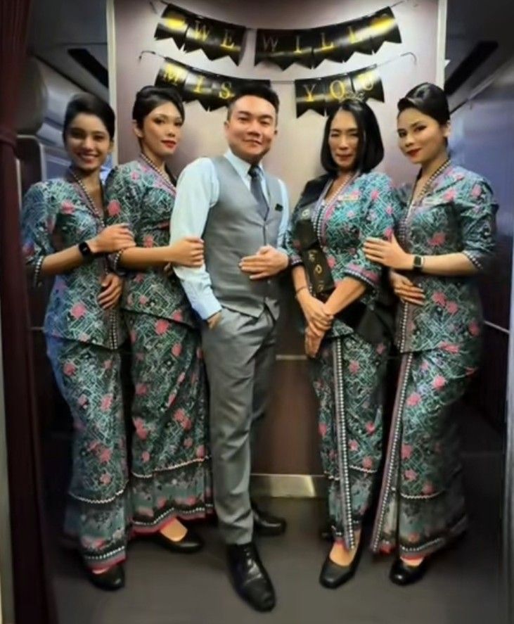 Zuhaimi Hashim (second from right) with her daughter Delilah Zainal (second from left) and fellow cabin crew members on a flight she will always treasure.