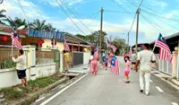 Families in Bahau unite to show national pride