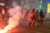 Serbia's police intervene to end standoff between ruling party supporters and anti-government protesters