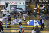 Tropical storm Podul disrupts travel and schools in southern China