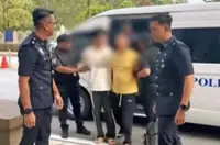 Two Chinese nationals charged with flying drone over restricted area