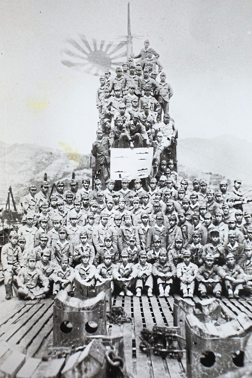 An undated photograph provided via the New York Times shows the crew of the submarine I-58, which was known to have sunk the ‘USS Indianapolis’ during WWII. As the 80th anniversary of the end of WWII approaches, only a few veterans remain.