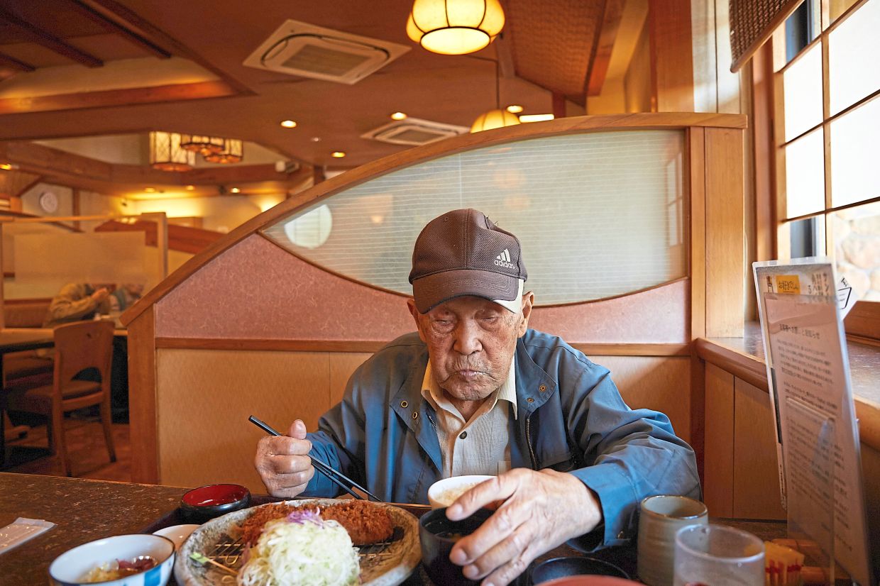 Kiyozumi, 97, who was the youngest crew member of the Japanese Imperial Navy submarine I-58 in WWII, at a restaurant in Matsuyama, Japan. — Ko Sasaki/The New York Times