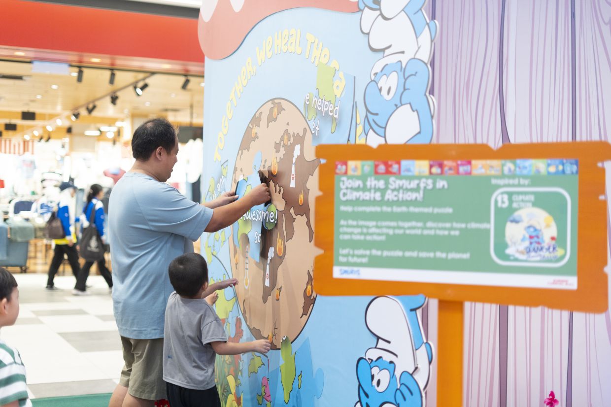 Visitors can explore environmental and sustainability themes in a tactile way through the wall puzzle. 