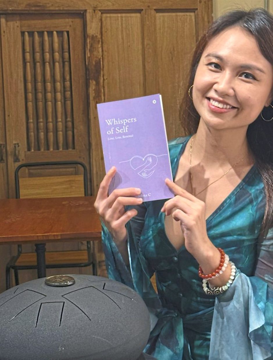 Chan's (pictured at her book launch) reverence for stillness is what led her to launch Whispers of Self not with a grand party, but with a meditation and reflection circle. Photo: Women's Circle of Malaysia