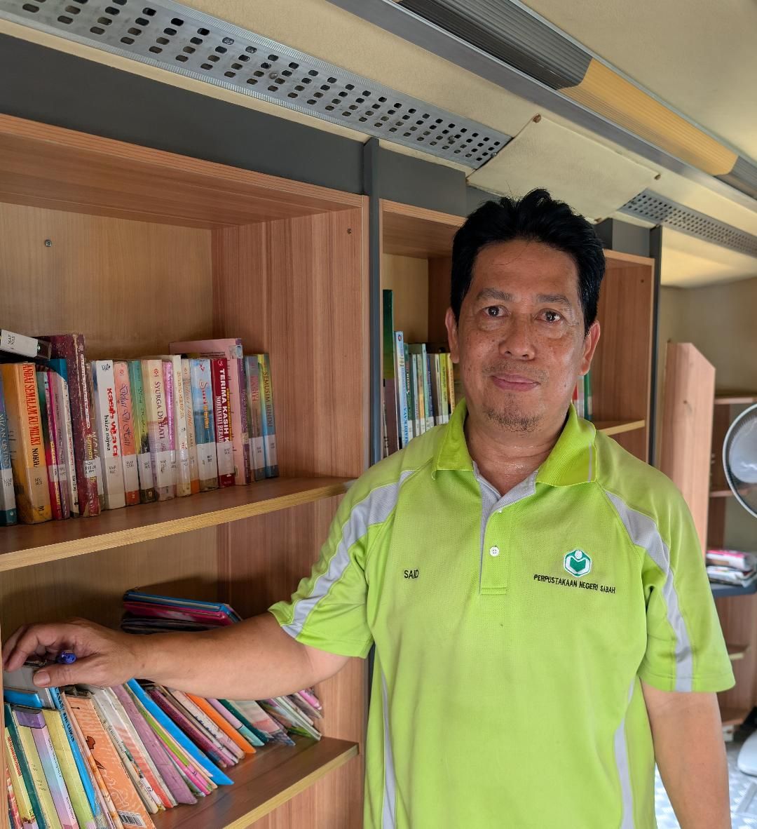 Muhammad has been a librarian for 20 years.