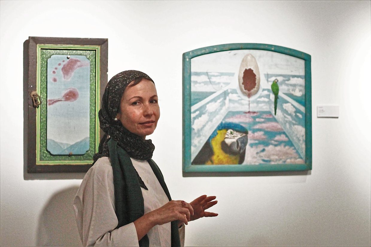 Adela, co-curator of the exhibition, shares insights into her father’s art practice and his unique East-West perspective. Photo: The Star/M. Irsyad 