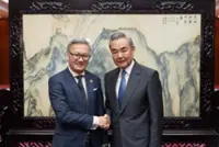 China, Lao FMs meet in Beijing, pledge stronger ties