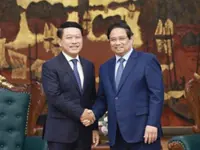 Vietnam willing to share experience in state-owned enterprises reform with Laos