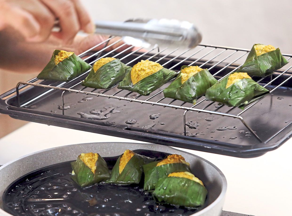 Steaming ensures tenderness, while grilling adds a layer of aroma.