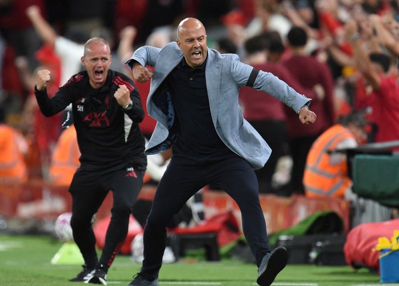 Soccer-Slot wowed by Liverpool late show in opening win over Bournemouth