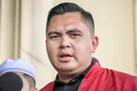 Akmal Saleh gives statement to police at Dang Wangi station