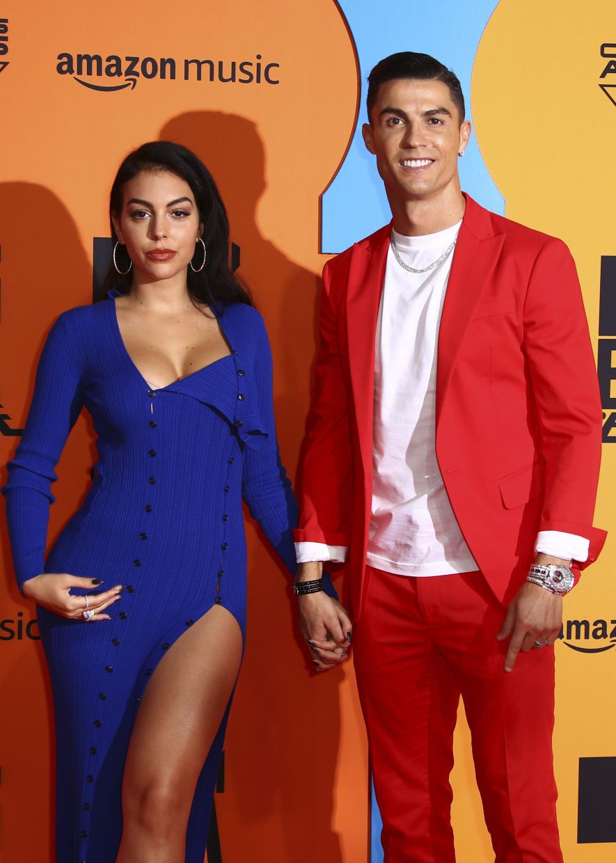 Ronaldo and Georgina Rodriguez posing for photographers at the European MTV Awards in Seville in 2019. — AP