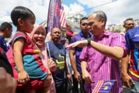 Fly the flag with courage, Fahmi urges all Malaysians