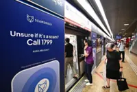 Three people, including two Malaysians, in Singapore to be charged over suspected involvement in scams