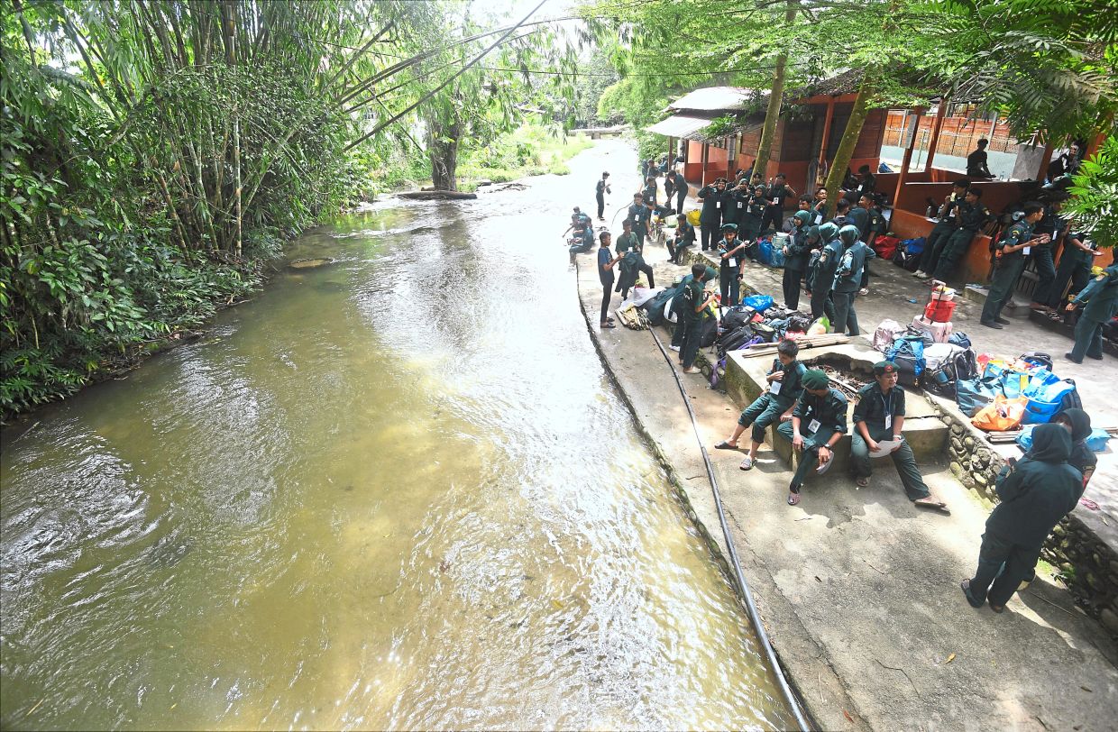 A group of students at a campsite at Sungai Pangsun in Dusun Tua, Hulu Langat. The area has many resorts, chalets, cafes and event spaces.