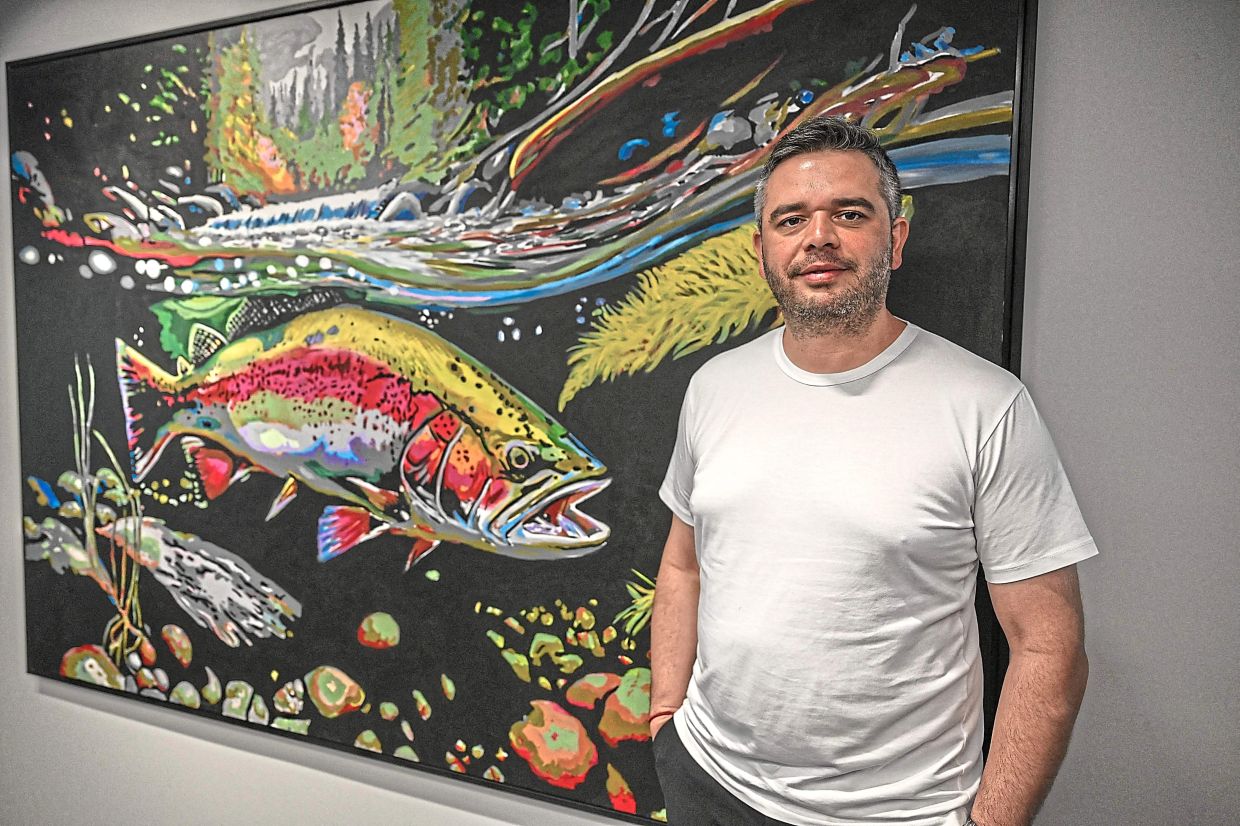 Denizer says the export of rainbow trout, raised in submerged cages, have made him a wealthy man.